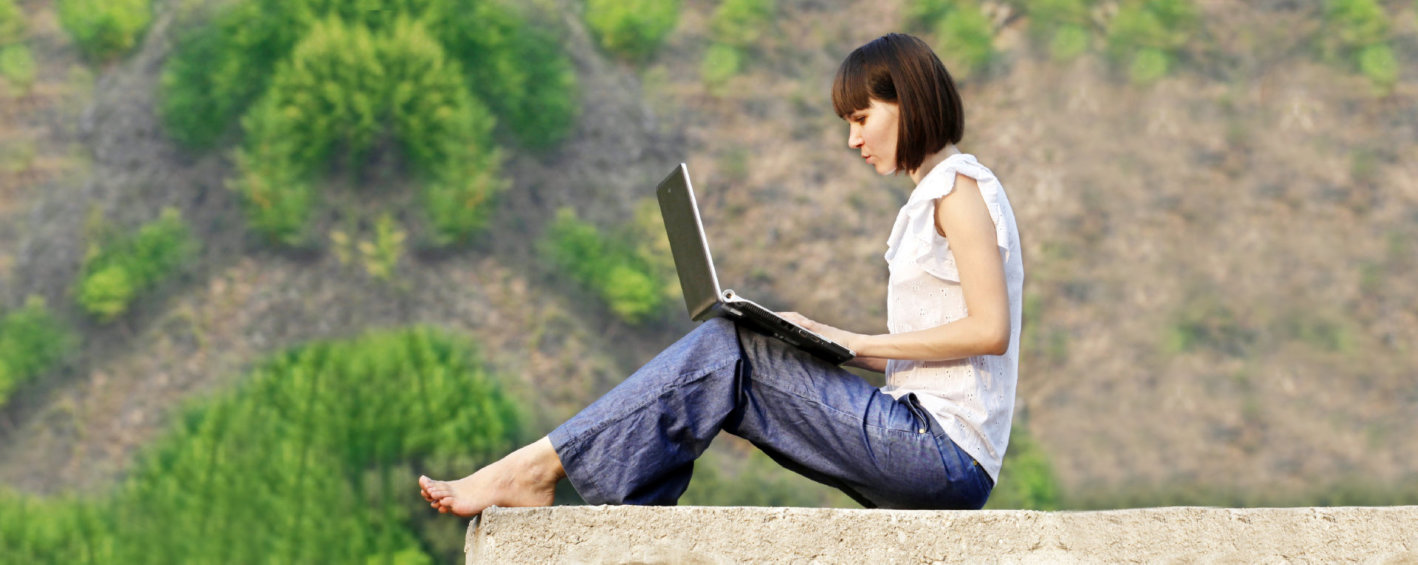 woman using her laptop