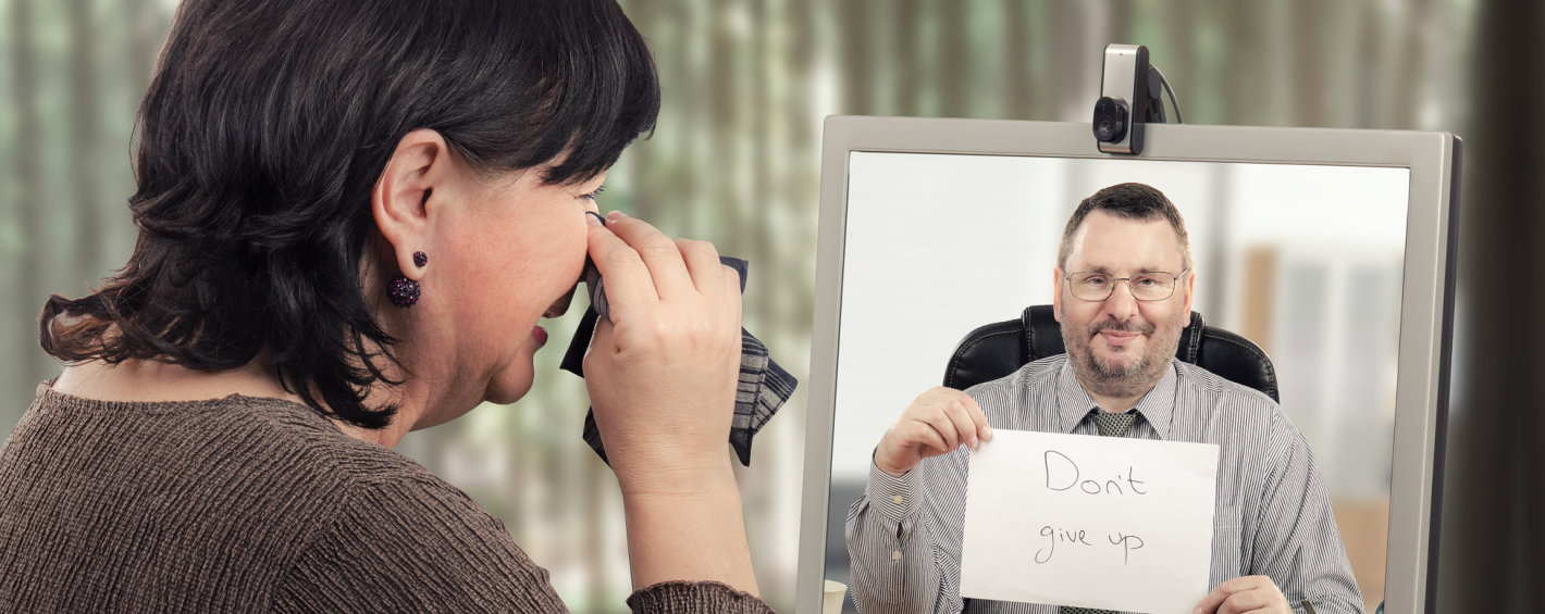 elderly woman doing video chat to her husband